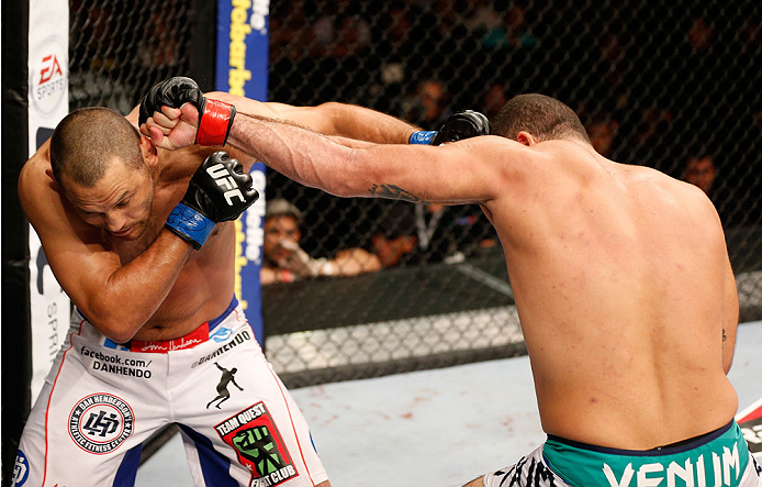 NATAL, BRAZIL - MARCH 23: (R-L) Mauricio "Shogun" Rua punches Dan Henderson in their light heavyweight bout during the UFC Fight Night event at Ginasio Nelio Dias on March 23, 2014 in Natal, Brazil. (Photo by Josh Hedges/Zuffa LLC/Zuffa LLC via Getty Ima