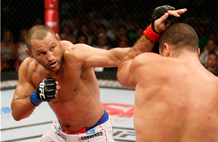 NATAL, BRAZIL - MARCH 23: (L-R) Dan Henderson punches Mauricio "Shogun" Rua in their light heavyweight bout during the UFC Fight Night event at Ginasio Nelio Dias on March 23, 2014 in Natal, Brazil. (Photo by Josh Hedges/Zuffa LLC/Zuffa LLC via Getty Ima