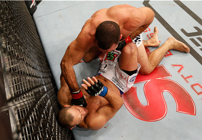 NATAL, BRAZIL - MARCH 23: (R-L) Mauricio "Shogun" Rua punches Dan Henderson in their light heavyweight bout during the UFC Fight Night event at Ginasio Nelio Dias on March 23, 2014 in Natal, Brazil. (Photo by Josh Hedges/Zuffa LLC/Zuffa LLC via Getty Ima