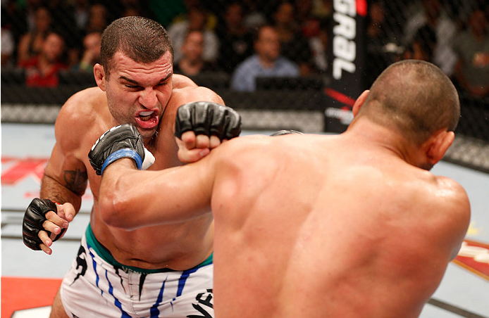 NATAL, BRAZIL - MARCH 23: (L-R) Mauricio "Shogun" Rua punches Dan Henderson in their light heavyweight bout during the UFC Fight Night event at Ginasio Nelio Dias on March 23, 2014 in Natal, Brazil. (Photo by Josh Hedges/Zuffa LLC/Zuffa LLC via Getty Ima