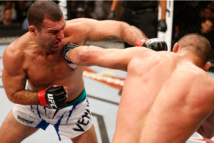 NATAL, BRAZIL - MARCH 23: (L-R) Mauricio "Shogun" Rua and Dan Henderson trade punches in their light heavyweight bout during the UFC Fight Night event at Ginasio Nelio Dias on March 23, 2014 in Natal, Brazil. (Photo by Josh Hedges/Zuffa LLC/Zuffa LLC via