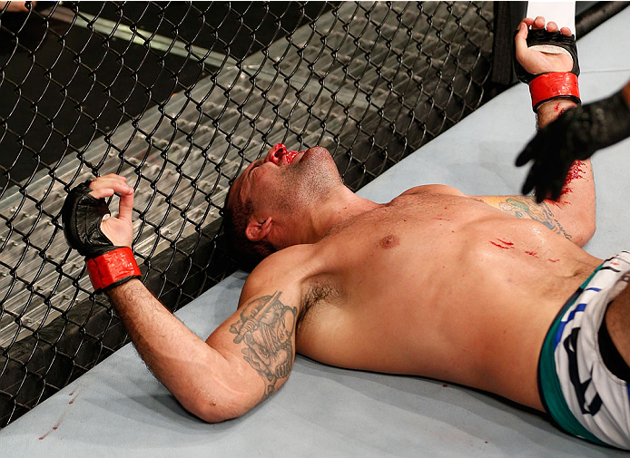 NATAL, BRAZIL - MARCH 23: Mauricio "Shogun" Rua reacts after his knockout loss to Dan Henderson in their light heavyweight bout during the UFC Fight Night event at Ginasio Nelio Dias on March 23, 2014 in Natal, Brazil. (Photo by Josh Hedges/Zuffa LLC/Zuf
