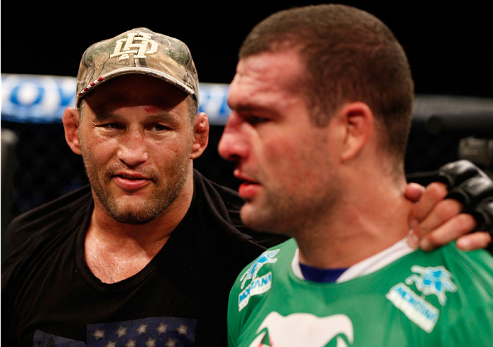 NATAL, BRAZIL - MARCH 23: (L-R) Dan Henderson provides words of encouragement for Mauricio "Shogun" Rua after knocking him out in their light heavyweight bout during the UFC Fight Night event at Ginasio Nelio Dias on March 23, 2014 in Natal, Brazil. (Pho