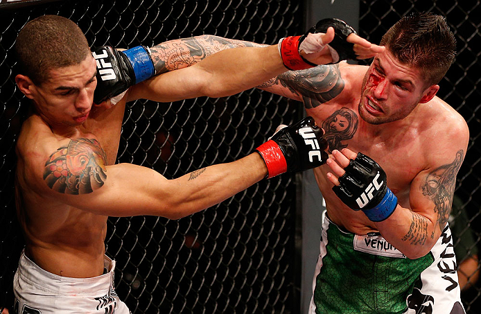 JARAGUA DO SUL, BRAZIL - MAY 18: (R-L) Jeremy Larsen punches Lucas Martins in their lightweight bout during the UFC on FX event on May 18, 2013 at Arena Jaragua in Jaragua do Sul, Santa Catarina, Brazil. (Photo by Josh Hedges/Zuffa LLC/Zuffa LLC via Getty