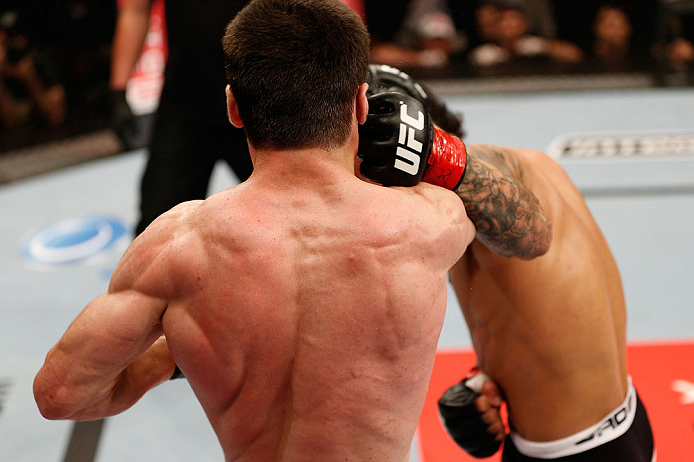 JARAGUA DO SUL, BRAZIL - MAY 18: (R-L) John Lineker punches Azamat Gashimov in their flyweight bout during the UFC on FX event on May 18, 2013 at Arena Jaragua in Jaragua do Sul, Santa Catarina, Brazil. (Photo by Josh Hedges/Zuffa LLC/Zuffa LLC via Get