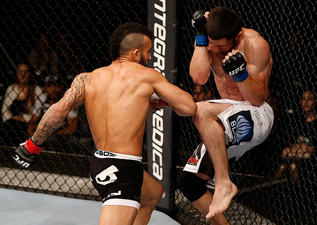 JARAGUA DO SUL, BRAZIL - MAY 18: (L-R) John Lineker punches Azamat Gashimov in their flyweight bout during the UFC on FX event on May 18, 2013 at Arena Jaragua in Jaragua do Sul, Santa Catarina, Brazil. (Photo by Josh Hedges/Zuffa LLC/Zuffa LLC via Get