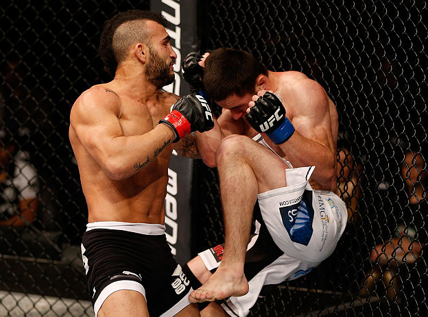 JARAGUA DO SUL, BRAZIL - MAY 18: (L-R) John Lineker punches Azamat Gashimov in their flyweight bout during the UFC on FX event on May 18, 2013 at Arena Jaragua in Jaragua do Sul, Santa Catarina, Brazil. (Photo by Josh Hedges/Zuffa LLC/Zuffa LLC via Get