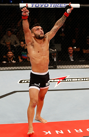 JARAGUA DO SUL, BRAZIL - MAY 18: John Lineker reacts after knocking out Azamat Gashimov in their flyweight bout during the UFC on FX event on May 18, 2013 at Arena Jaragua in Jaragua do Sul, Santa Catarina, Brazil. (Photo by Josh Hedges/Zuffa LLC/Zuffa