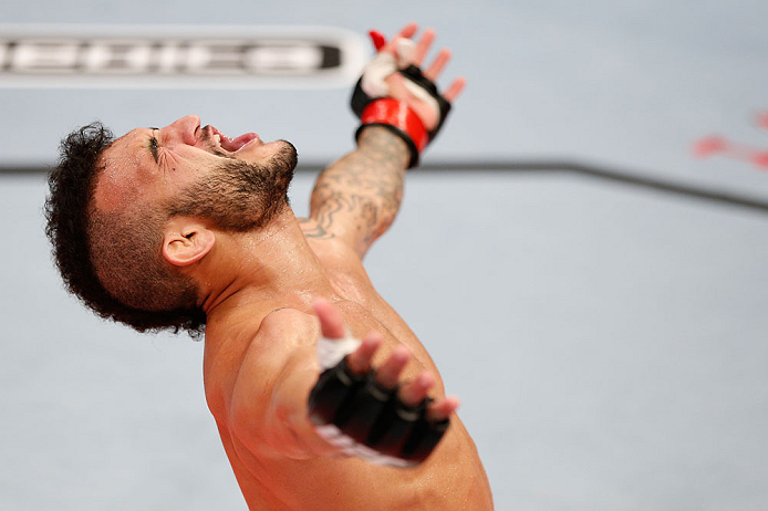 JARAGUA DO SUL, BRAZIL - MAY 18: John Lineker reacts after knocking out Azamat Gashimov in their flyweight bout during the UFC on FX event on May 18, 2013 at Arena Jaragua in Jaragua do Sul, Santa Catarina, Brazil. (Photo by Josh Hedges/Zuffa LLC/Zuffa