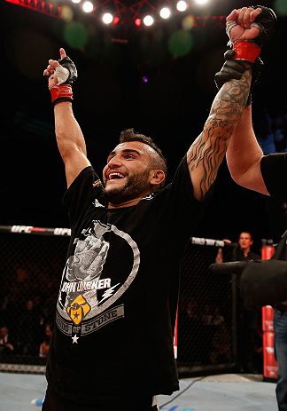 JARAGUA DO SUL, BRAZIL - MAY 18: John Lineker reacts after knocking out Azamat Gashimov in their flyweight bout during the UFC on FX event on May 18, 2013 at Arena Jaragua in Jaragua do Sul, Santa Catarina, Brazil. (Photo by Josh Hedges/Zuffa LLC/Zuffa