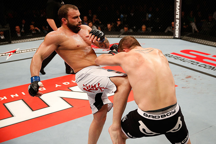 JARAGUA DO SUL, BRAZIL - MAY 18: (L-R) Roger Hollett knees Fabio Maldonado in their light heavyweight bout during the UFC on FX event on May 18, 2013 at Arena Jaragua in Jaragua do Sul, Santa Catarina, Brazil. (Photo by Josh Hedges/Zuffa LLC/Zuffa LLC via
