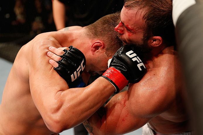 JARAGUA DO SUL, BRAZIL - MAY 18: (L-R) Fabio Maldonado punches Roger Hollett in their light heavyweight bout during the UFC on FX event on May 18, 2013 at Arena Jaragua in Jaragua do Sul, Santa Catarina, Brazil. (Photo by Josh Hedges/Zuffa LLC/Zuffa LLC v