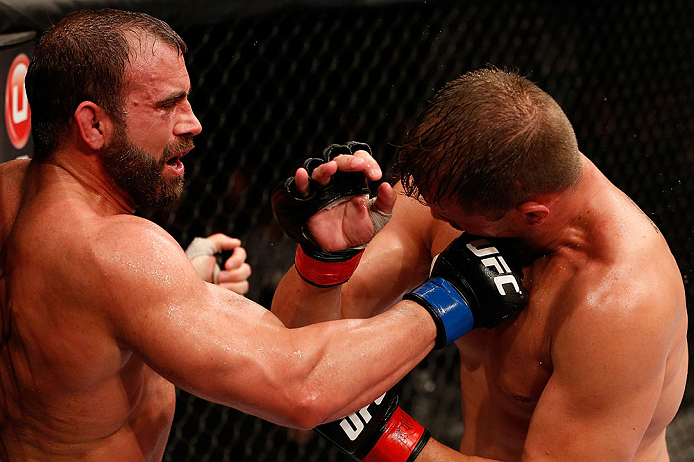 JARAGUA DO SUL, BRAZIL - MAY 18: (L-R) Roger Hollett punches Fabio Maldonado in their light heavyweight bout during the UFC on FX event on May 18, 2013 at Arena Jaragua in Jaragua do Sul, Santa Catarina, Brazil. (Photo by Josh Hedges/Zuffa LLC/Zuffa LLC v