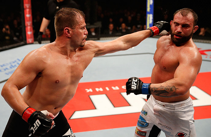 JARAGUA DO SUL, BRAZIL - MAY 18: (L-R) Fabio Maldonado punches Roger Hollett in their light heavyweight bout during the UFC on FX event on May 18, 2013 at Arena Jaragua in Jaragua do Sul, Santa Catarina, Brazil. (Photo by Josh Hedges/Zuffa LLC/Zuffa LLC v