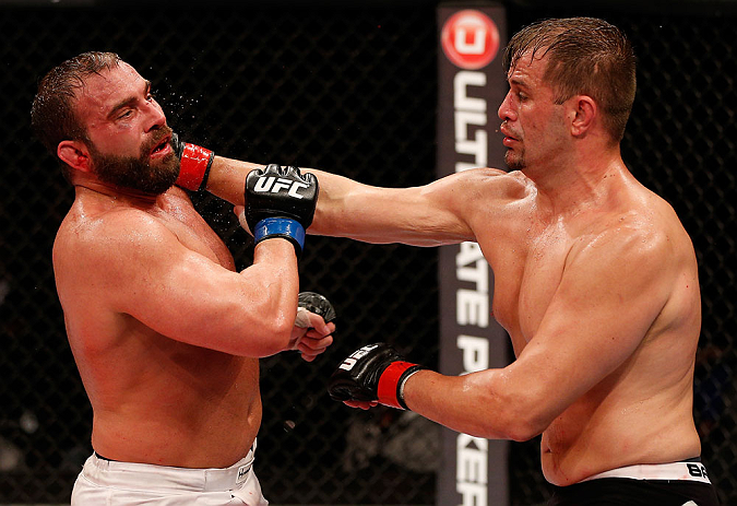 JARAGUA DO SUL, BRAZIL - MAY 18: (R-L) Fabio Maldonado punches Roger Hollett in their light heavyweight bout during the UFC on FX event on May 18, 2013 at Arena Jaragua in Jaragua do Sul, Santa Catarina, Brazil. (Photo by Josh Hedges/Zuffa LLC/Zuffa LLC v