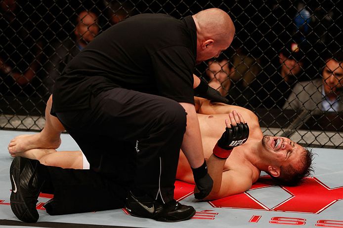 JARAGUA DO SUL, BRAZIL - MAY 18: Fabio Maldonado reacts after absorbing a low blow against Roger Hollett in their light heavyweight bout during the UFC on FX event on May 18, 2013 at Arena Jaragua in Jaragua do Sul, Santa Catarina, Brazil. (Photo by Josh