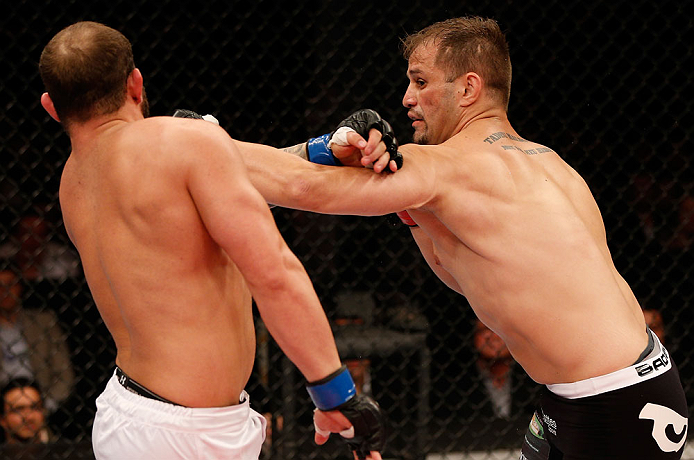 JARAGUA DO SUL, BRAZIL - MAY 18: (R-L) Fabio Maldonado punches Roger Hollett in their light heavyweight bout during the UFC on FX event on May 18, 2013 at Arena Jaragua in Jaragua do Sul, Santa Catarina, Brazil. (Photo by Josh Hedges/Zuffa LLC/Zuffa LLC v