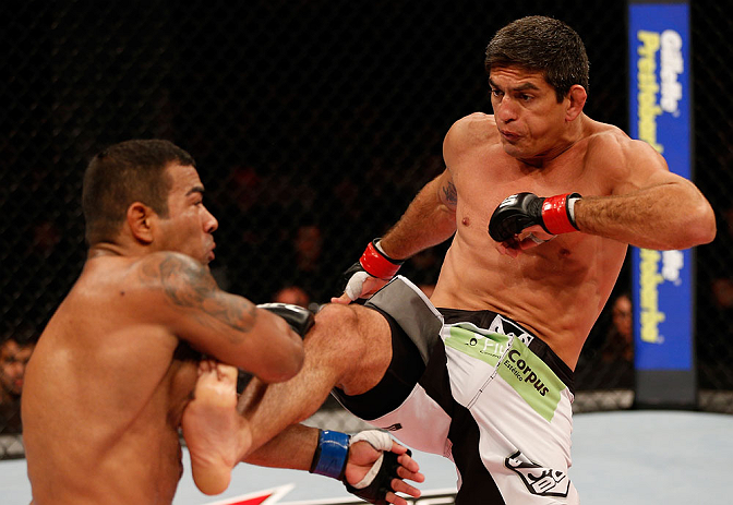 JARAGUA DO SUL, BRAZIL - MAY 18: (R-L) Paulo Thiago kicks Michel Prazeres in their welterweight bout during the UFC on FX event on May 18, 2013 at Arena Jaragua in Jaragua do Sul, Santa Catarina, Brazil. (Photo by Josh Hedges/Zuffa LLC/Zuffa LLC via Ge