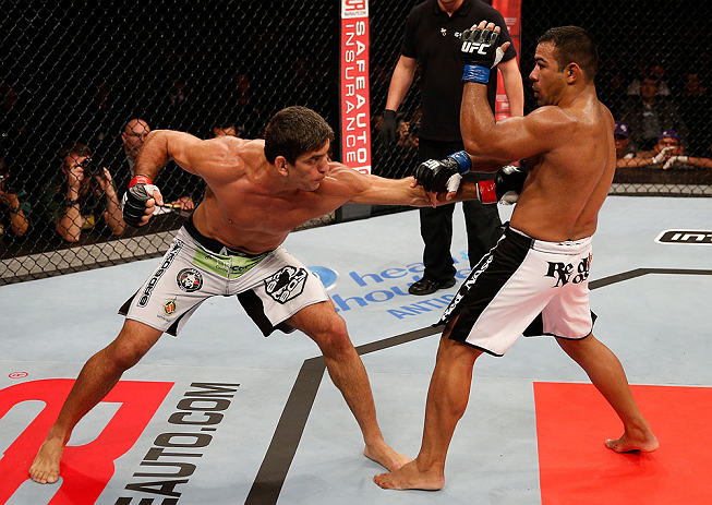 JARAGUA DO SUL, BRAZIL - MAY 18: (L-R) Paulo Thiago punches Michel Prazeres in their welterweight bout during the UFC on FX event on May 18, 2013 at Arena Jaragua in Jaragua do Sul, Santa Catarina, Brazil. (Photo by Josh Hedges/Zuffa LLC/Zuffa LLC via Get