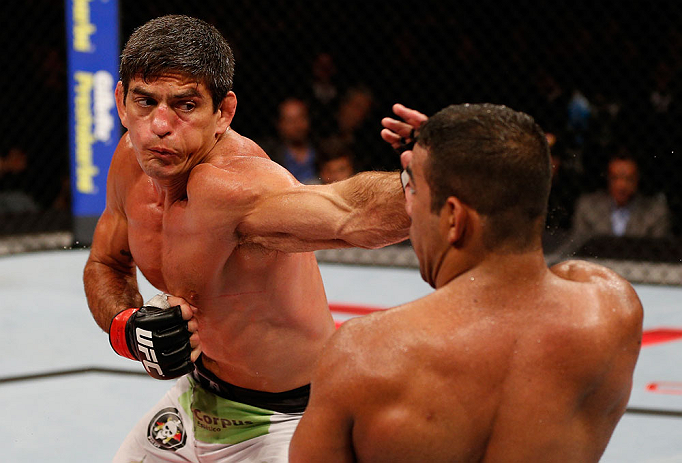 JARAGUA DO SUL, BRAZIL - MAY 18: (L-R) Paulo Thiago punches Michel Prazeres in their welterweight bout during the UFC on FX event on May 18, 2013 at Arena Jaragua in Jaragua do Sul, Santa Catarina, Brazil. (Photo by Josh Hedges/Zuffa LLC/Zuffa LLC via