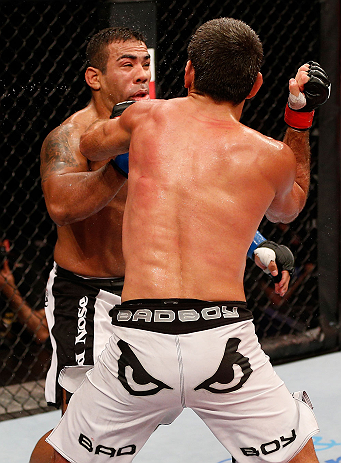 JARAGUA DO SUL, BRAZIL - MAY 18: (R-L) Paulo Thiago punches Michel Prazeres in their welterweight bout during the UFC on FX event on May 18, 2013 at Arena Jaragua in Jaragua do Sul, Santa Catarina, Brazil. (Photo by Josh Hedges/Zuffa LLC/Zuffa LLC via Get