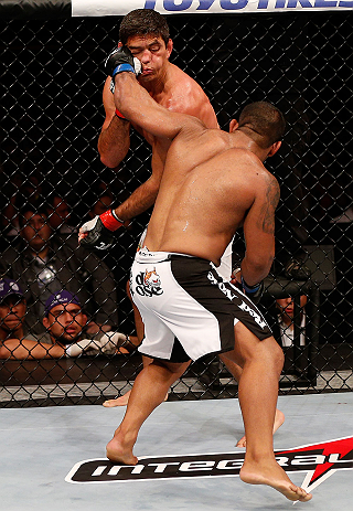 JARAGUA DO SUL, BRAZIL - MAY 18: (R-L) Michel Prazeres punches Paulo Thiago in their welterweight bout during the UFC on FX event on May 18, 2013 at Arena Jaragua in Jaragua do Sul, Santa Catarina, Brazil. (Photo by Josh Hedges/Zuffa LLC/Zuffa LLC via Get