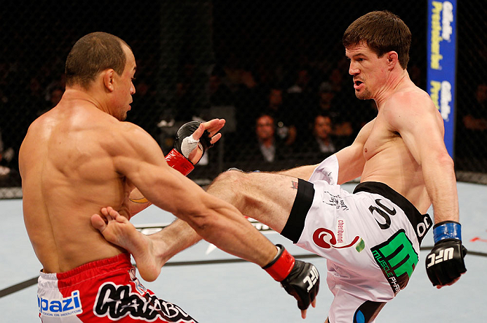 JARAGUA DO SUL, BRAZIL - MAY 18: (R-L) John Cholish kicks Gleison Tibau in their lightweight bout during the UFC on FX event on May 18, 2013 at Arena Jaragua in Jaragua do Sul, Santa Catarina, Brazil. (Photo by Josh Hedges/Zuffa LLC/Zuffa LLC via Getty Im