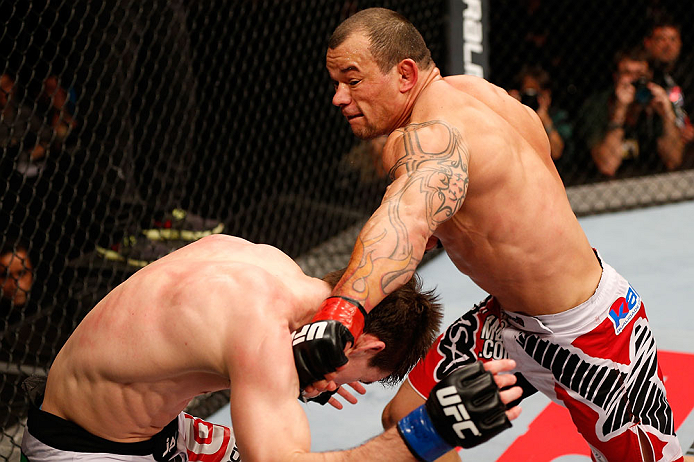 JARAGUA DO SUL, BRAZIL - MAY 18: (R-L) Gleison Tibau punches John Cholish in their lightweight bout during the UFC on FX event on May 18, 2013 at Arena Jaragua in Jaragua do Sul, Santa Catarina, Brazil. (Photo by Josh Hedges/Zuffa LLC/Zuffa LLC via Getty