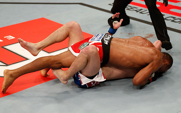 JARAGUA DO SUL, BRAZIL - MAY 18: (R-L) Francisco Trinaldo secures an arm triangle choke against Mike Rio in their lightweight bout during the UFC on FX event on May 18, 2013 at Arena Jaragua in Jaragua do Sul, Santa Catarina, Brazil. (Photo by Josh Hed