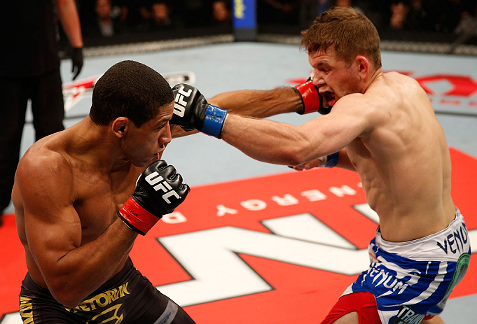 JARAGUA DO SUL, BRAZIL - MAY 18: (L-R) Hacran Dias punches Nik Lentz in their featherweight bout during the UFC on FX event on May 18, 2013 at Arena Jaragua in Jaragua do Sul, Santa Catarina, Brazil. (Photo by Josh Hedges/Zuffa LLC/Zuffa LLC via Getty Ima
