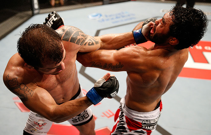 JARAGUA DO SUL, BRAZIL - MAY 18: (L-R) Joao Zeferino punches Rafael Natal in their middleweight bout during the UFC on FX event on May 18, 2013 at Arena Jaragua in Jaragua do Sul, Santa Catarina, Brazil. (Photo by Josh Hedges/Zuffa LLC/Zuffa LLC via Getty