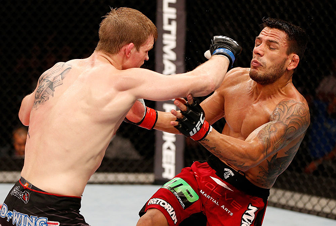 JARAGUA DO SUL, BRAZIL - MAY 18: (L-R) Evan Dunham punches Rafael dos Anjos in their lightweight bout during the UFC on FX event on May 18, 2013 at Arena Jaragua in Jaragua do Sul, Santa Catarina, Brazil. (Photo by Josh Hedges/Zuffa LLC/Zuffa LLC via Gett