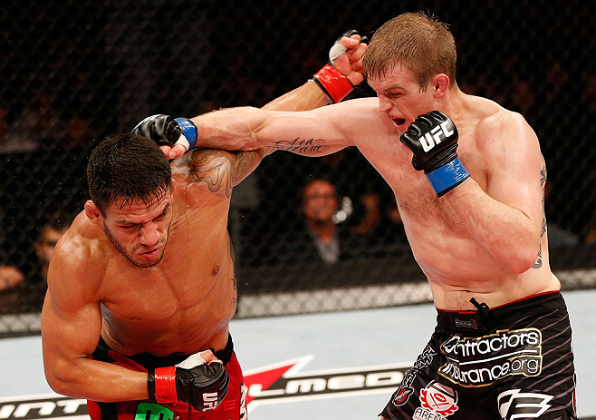 JARAGUA DO SUL, BRAZIL - MAY 18: (R-L) Evan Dunham punches Rafael dos Anjos in their lightweight bout during the UFC on FX event on May 18, 2013 at Arena Jaragua in Jaragua do Sul, Santa Catarina, Brazil. (Photo by Josh Hedges/Zuffa LLC/Zuffa LLC via Gett