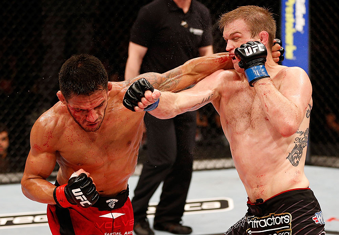 JARAGUA DO SUL, BRAZIL - MAY 18: (R-L) Evan Dunham and Rafael dos Anjos trade punches in their lightweight bout during the UFC on FX event on May 18, 2013 at Arena Jaragua in Jaragua do Sul, Santa Catarina, Brazil. (Photo by Josh Hedges/Zuffa LLC/Zuffa LL