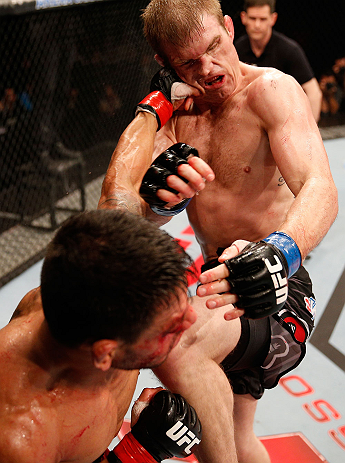 JARAGUA DO SUL, BRAZIL - MAY 18: (L-R) Rafael dos Anjos punches Evan Dunham in their lightweight bout during the UFC on FX event on May 18, 2013 at Arena Jaragua in Jaragua do Sul, Santa Catarina, Brazil. (Photo by Josh Hedges/Zuffa LLC/Zuffa LLC via Gett