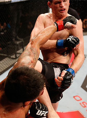 JARAGUA DO SUL, BRAZIL - MAY 18: (L-R) Rafael dos Anjos punches Evan Dunham in their lightweight bout during the UFC on FX event on May 18, 2013 at Arena Jaragua in Jaragua do Sul, Santa Catarina, Brazil. (Photo by Josh Hedges/Zuffa LLC/Zuffa LLC via Gett