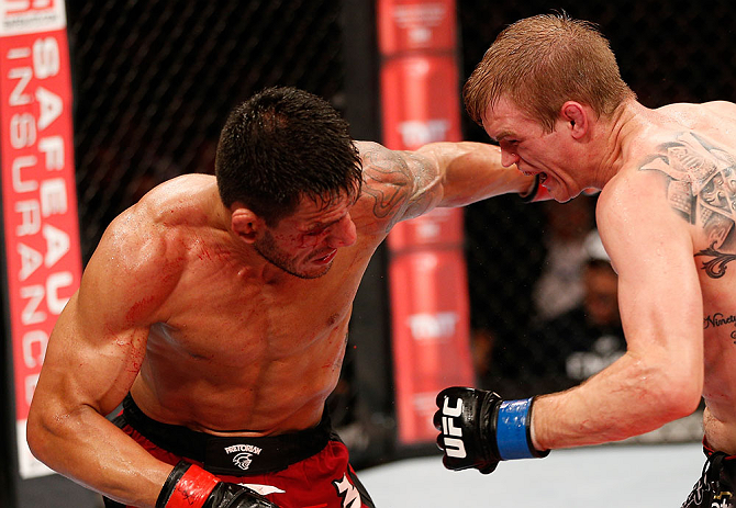 JARAGUA DO SUL, BRAZIL - MAY 18: (L-R) Rafael dos Anjos punches Evan Dunham in their lightweight bout during the UFC on FX event on May 18, 2013 at Arena Jaragua in Jaragua do Sul, Santa Catarina, Brazil. (Photo by Josh Hedges/Zuffa LLC/Zuffa LLC via G