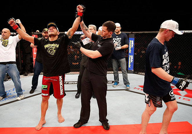 JARAGUA DO SUL, BRAZIL - MAY 18: Rafael dos Anjos (L) reacts after defeating Evan Dunham in their lightweight bout during the UFC on FX event on May 18, 2013 at Arena Jaragua in Jaragua do Sul, Santa Catarina, Brazil. (Photo by Josh Hedges/Zuffa LLC/Zu
