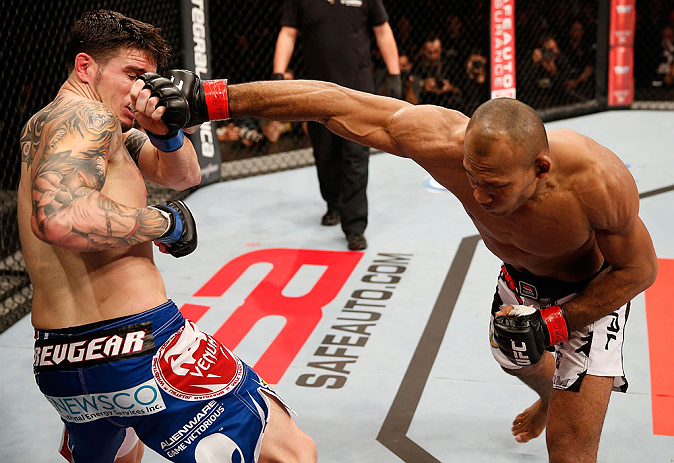 JARAGUA DO SUL, BRAZIL - MAY 18: (R-L) Ronaldo "Jacare" Souza punches Chris Camozzi in their middleweight bout during the UFC on FX event on May 18, 2013 at Arena Jaragua in Jaragua do Sul, Santa Catarina, Brazil. (Photo by Josh Hedges/Zuffa LLC/Zuffa
