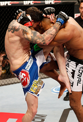 JARAGUA DO SUL, BRAZIL - MAY 18: (L-R) Chris Camozzi knees Ronaldo 'Jacare' Souza in their middleweight bout during the UFC on FX event on May 18, 2013 at Arena Jaragua in Jaragua do Sul, Santa Catarina, Brazil. (Photo by Josh Hedges/Zuffa LLC/Zuffa LL