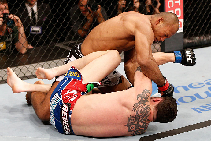 JARAGUA DO SUL, BRAZIL - MAY 18: (L-R) Ronaldo 'Jacare' Souza punches Chris Camozzi in their middleweight bout during the UFC on FX event on May 18, 2013 at Arena Jaragua in Jaragua do Sul, Santa Catarina, Brazil. (Photo by Josh Hedges/Zuffa LLC/Zuffa