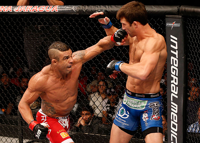 JARAGUA DO SUL, BRAZIL - MAY 18: (L-R) Vitor Belfort punches Luke Rockhold in their middleweight bout during the UFC on FX event on May 18, 2013 at Arena Jaragua in Jaragua do Sul, Santa Catarina, Brazil. (Photo by Josh Hedges/Zuffa LLC/Zuffa LLC via G