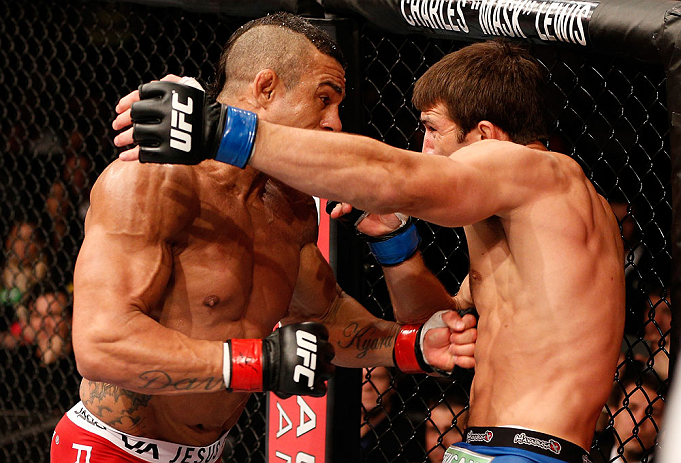 JARAGUA DO SUL, BRAZIL - MAY 18: (L-R) Vitor Belfort punches Luke Rockhold in their middleweight bout during the UFC on FX event on May 18, 2013 at Arena Jaragua in Jaragua do Sul, Santa Catarina, Brazil. (Photo by Josh Hedges/Zuffa LLC/Zuffa LLC via G
