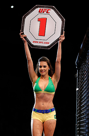 JARAGUA DO SUL, BRAZIL - MAY 18: UFC Octagon Girl Camila Rodrigues de Oliveira introduces a round during the UFC on FX event on May 18, 2013 at Arena Jaragua in Jaragua do Sul, Santa Catarina, Brazil. (Photo by Josh Hedges/Zuffa LLC/Zuffa LLC via Getty Im