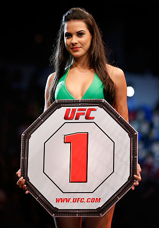 JARAGUA DO SUL, BRAZIL - MAY 18: UFC Octagon Girl Camila Rodrigues de Oliveira introduces a round during the UFC on FX event on May 18, 2013 at Arena Jaragua in Jaragua do Sul, Santa Catarina, Brazil. (Photo by Josh Hedges/Zuffa LLC/Zuffa LLC via Getty Im