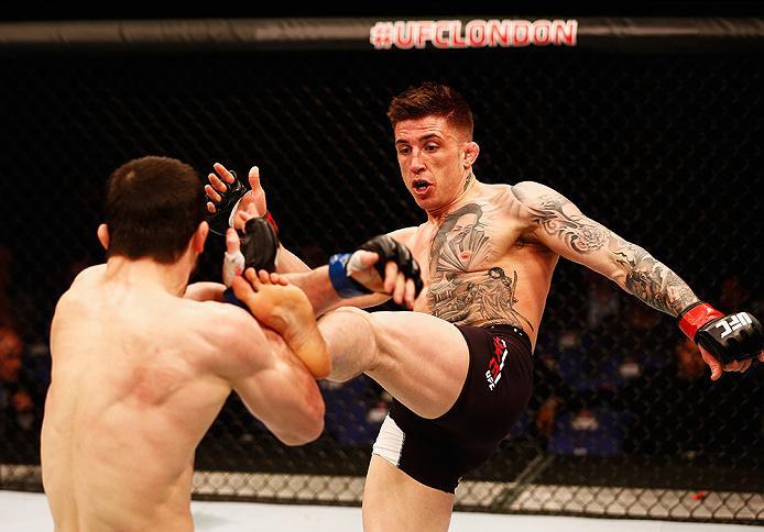 LONDON, ENGLAND - FEBRUARY 27: Norman 'Stormin' Parke of Northern Ireland attempts a round house kick on Rustam 'Tiger' Khabilov of Russia compete in their Lightweight bout during the UFC Fight Night held at at Indigo at The O2 Arena on February 27, 2016