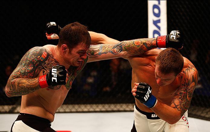 LONDON, ENGLAND - FEBRUARY 27: Brad 'Bear' Scott of England (L) and Krzysztof Jotko of Poland (R) compete in their Middleweight bout during the UFC Fight Night held at at Indigo at The O2 Arena on February 27, 2016 in London, England. (Photo by Dean Mou