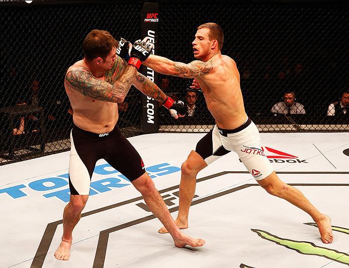 LONDON, ENGLAND - FEBRUARY 27: Brad 'Bear' Scott of England (L) and Krzysztof Jotko of Poland (R) compete in their Middleweight bout during the UFC Fight Night held at at Indigo at The O2 Arena on February 27, 2016 in London, England. (Photo by Dean Mou