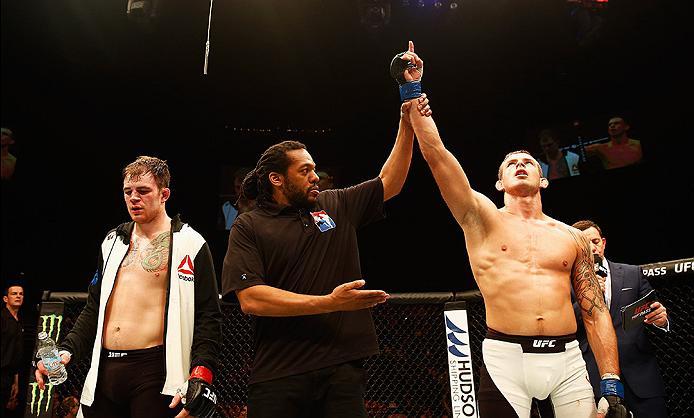 LONDON, ENGLAND - FEBRUARY 27: Krzysztof Jotko of Poland celebrates after beating Brad 'Bear' Scott of England in their Middleweight bout during the UFC Fight Night held at at Indigo at The O2 Arena on February 27, 2016 in London, England. (Photo by De