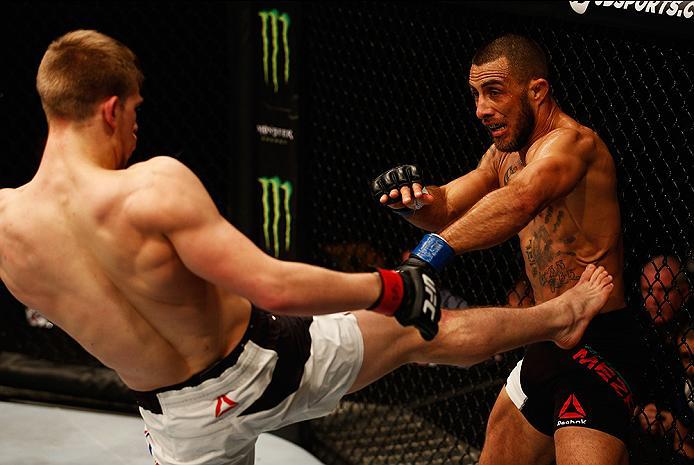 LONDON, ENGLAND - FEBRUARY 27: Arnold 'Almighty' Allen of England (L) and Yaotzin Meza of the USA (R) compete in their Featherweight bout during the UFC Fight Night held at at Indigo at The O2 Arena on February 27, 2016 in London, England. (Photo by Dea